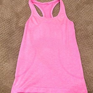 I’m selling this lululemon swiftly tech tank in a rare pink color!